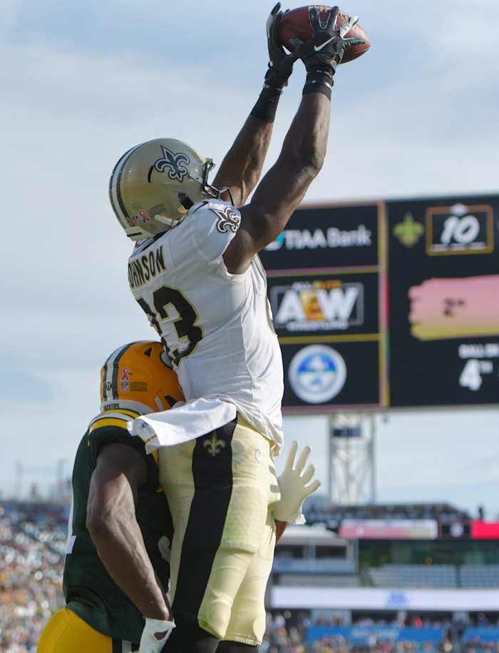 Saints TE Juwan Johnson pulls in a touchdown pass from quarterback (2) Jameis Winston against the the Green Bay Packers. Bob Self/Florida Times-Union via Imagn Content Services, LLC